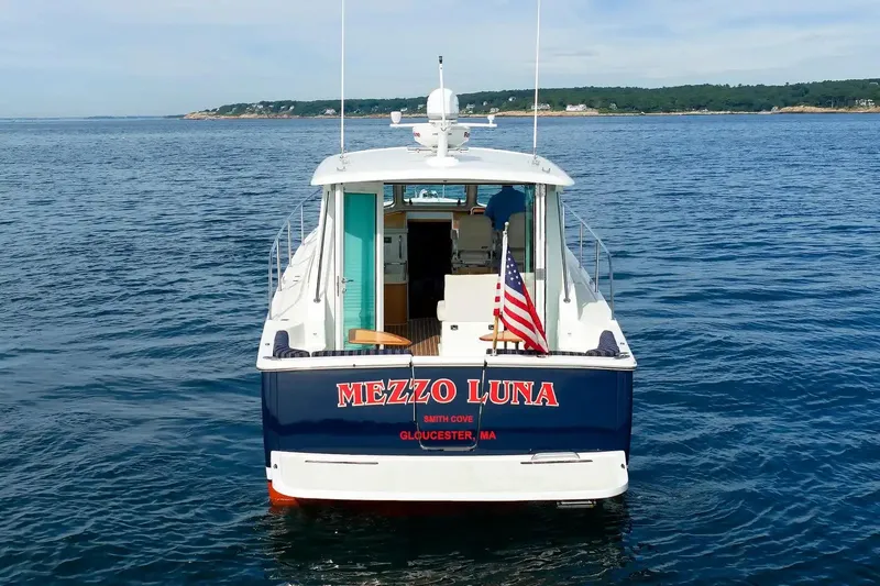 Slide: The Image of 2017 Back Cove Yachts 37, named Mezzo Luna, on calm ocean waters near Gloucester, MA. - 7