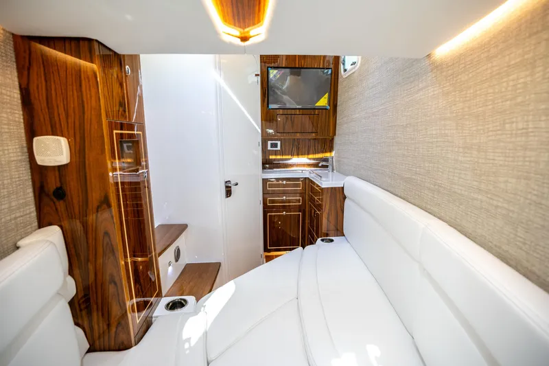 Slide: The Image of Luxurious interior of 2027 HCB 42 Lujo yacht with elegant wood finishes and modern amenities. - 4