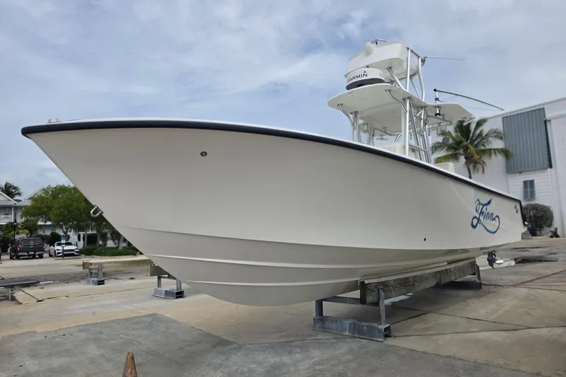 Slide: The Image of 2016 SeaVee 320B boat on dry dock, showcasing sleek design and sturdy build. - 17