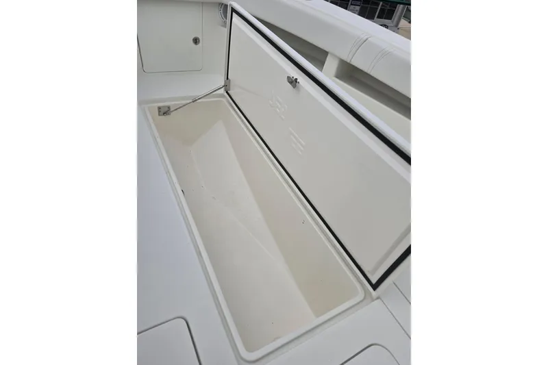 Slide: The Image of Open storage compartment on a 2016 SeaVee 320B boat. - 4