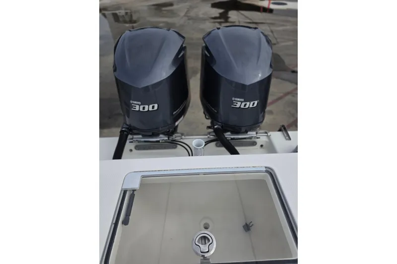 Slide: The Image of 2016 SeaVee 320B boat with twin Yamaha 300 engines and a livewell. - 10