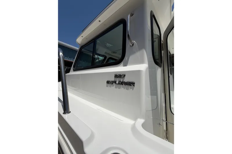 Slide: The Image of Parker 227 Explorer 2027 boat exterior with sleek design and modern windows. - 5
