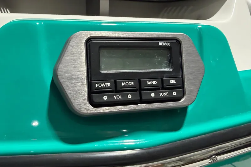 Slide: The Image of Control panel on 2022 Malibu Wakesetter 23 LSV boat, featuring buttons and display. - 7