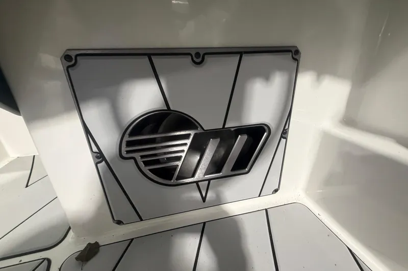 Slide: The Image of 2022 Malibu Wakesetter 23 LSV interior detail with logo and sleek design elements. - 28