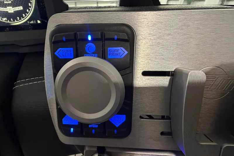 Slide: The Image of Control panel of 2022 Malibu Wakesetter 23 LSV with illuminated surf settings. - 24