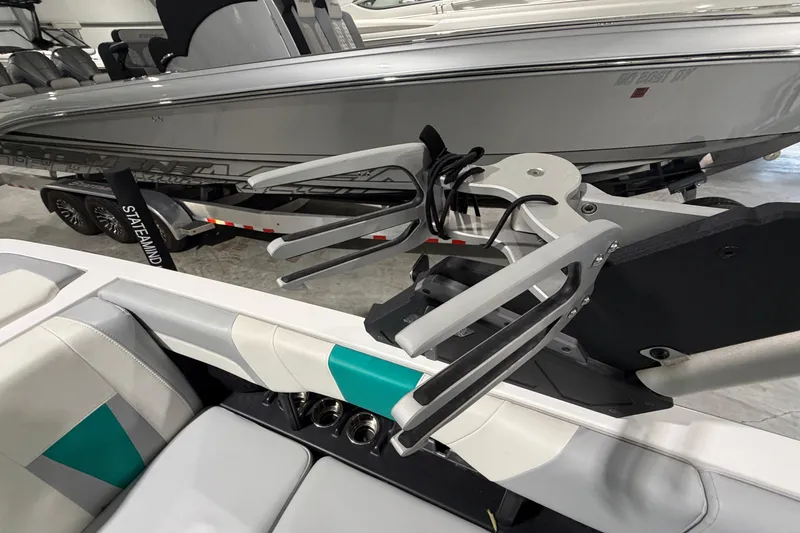 Slide: The Image of 2022 Malibu Wakesetter 23 LSV boat interior with wakeboard rack detail. - 13