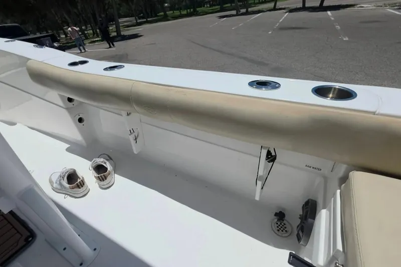 Slide: The Image of Interior view of a 2017 Sea Fox 226 Commander boat with beige seating and cup holders. - 30