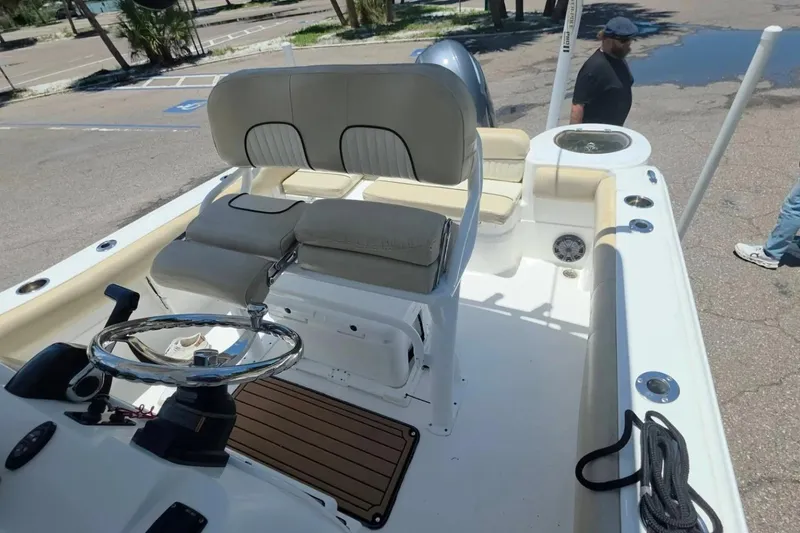 Slide: The Image of 2017 Sea Fox 226 Commander boat interior with seating and steering wheel. - 15