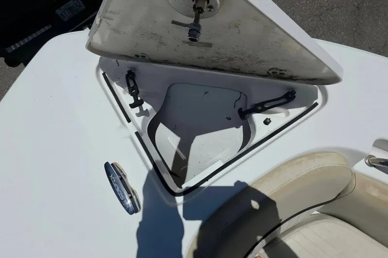 Slide: The Image of Open storage compartment on a 2017 Sea Fox 226 Commander boat deck. - 38