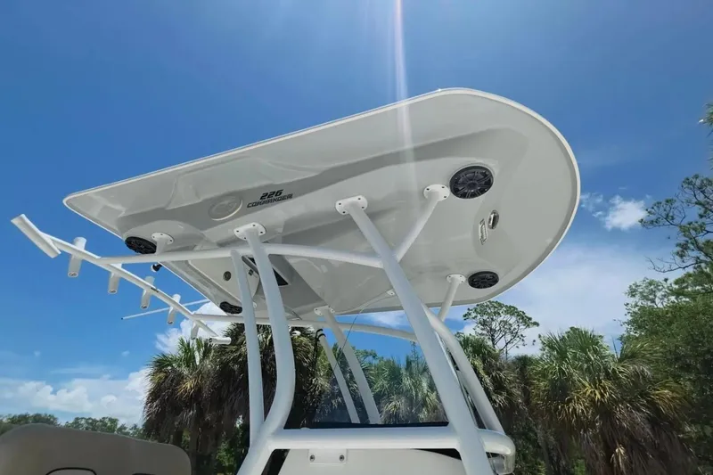 Slide: The Image of 2017 Sea Fox 226 Commander boat canopy against a clear blue sky. - 27