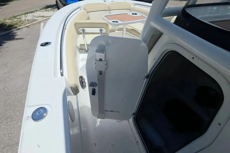 Slide: The Image of 2017 Sea Fox 226 Commander boat interior with seating and storage compartment. - 39