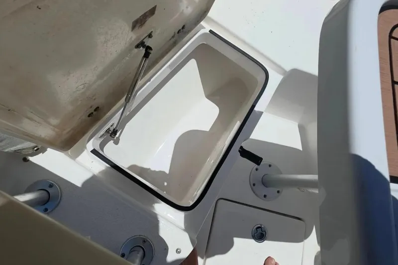 Slide: The Image of Open storage compartment on a 2017 Sea Fox 226 Commander boat. - 36