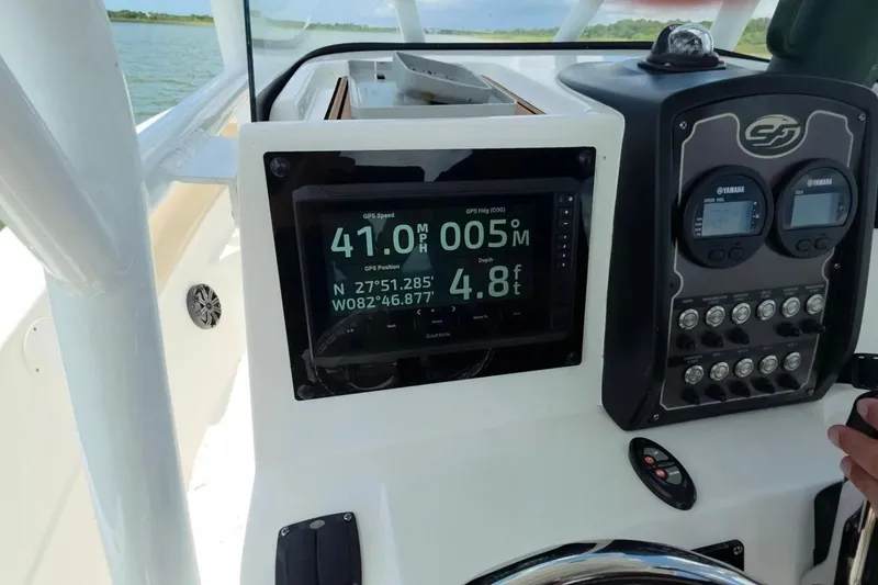 Slide: The Image of 2017 Sea Fox 226 Commander dashboard with GPS display showing speed and coordinates. - 22