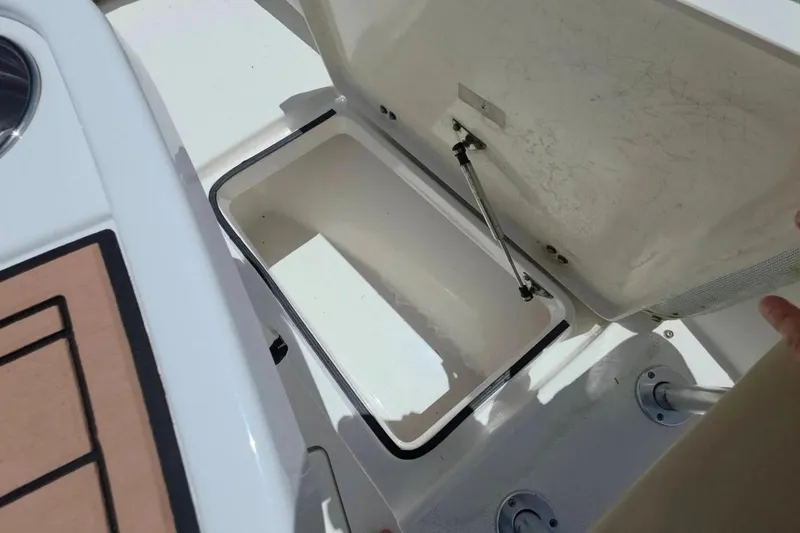 Slide: The Image of Open storage compartment on a 2017 Sea Fox 226 Commander boat. - 35