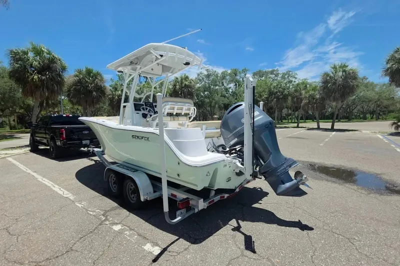 Slide: The Image of 2017 Sea Fox 226 Commander boat on trailer in sunny parking lot. - 7
