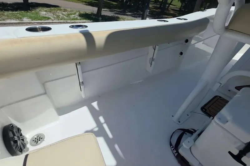 Slide: The Image of 2017 Sea Fox 226 Commander boat interior with seating and cup holders. - 29