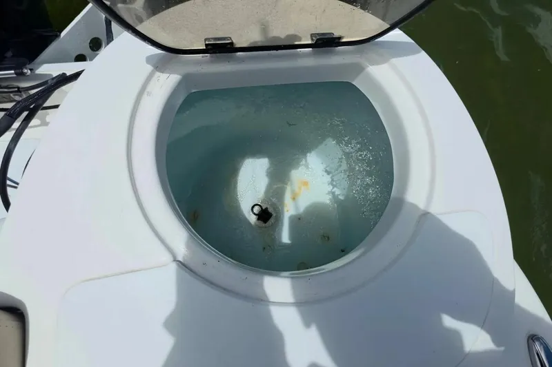 Slide: The Image of Livewell on a 2017 Sea Fox 226 Commander boat, open and filled with water. - 10