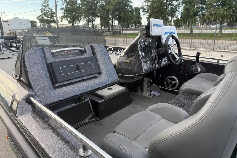 Slide: The Image of 2008 Bass Cat Pantera IV boat interior with steering console and seating. - 10