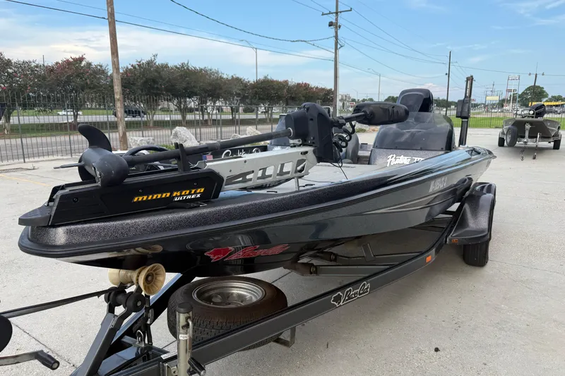 Slide: The Image of 2008 Bass Cat Pantera IV boat on trailer, featuring Minn Kota Ultrex trolling motor. - 4