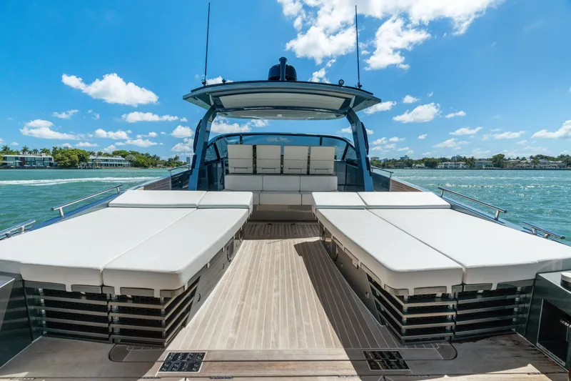 Slide: The Image of 2024 CNM CONTINENTAL 54 SuperSport yacht with spacious deck and luxurious seating. - 22