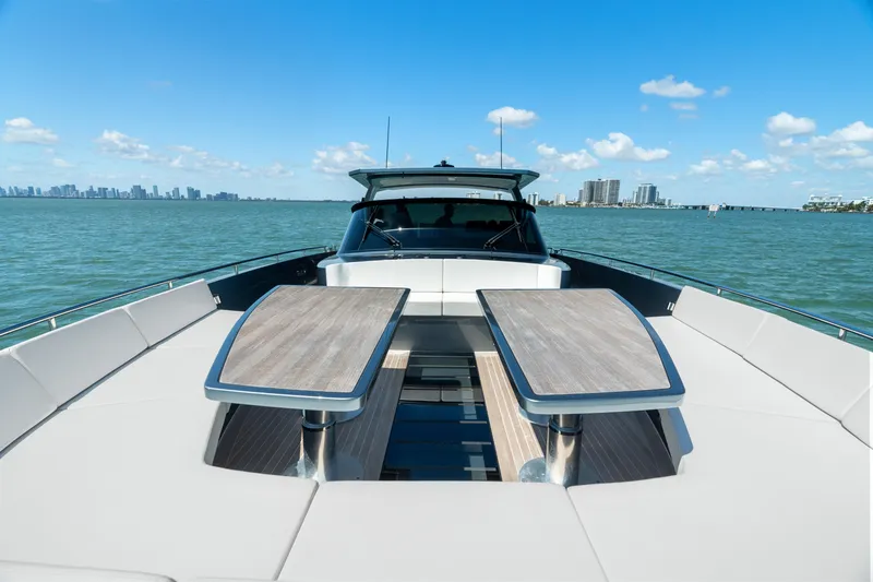 Slide: The Image of 2024 CNM CONTINENTAL 54 SuperSport yacht on open water, featuring sleek design and luxury amenities. - 47
