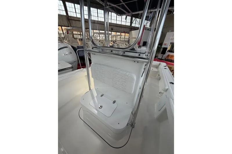 Slide: The Image of 2027 Parker 180 Coastal boat interior with seating and storage. - 14