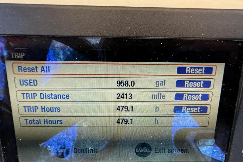 Slide: The Image of Display screen showing trip data: 958 gallons used, 2413 miles traveled, 479.1 hours logged. Scout 235 XSF 2018. - 13