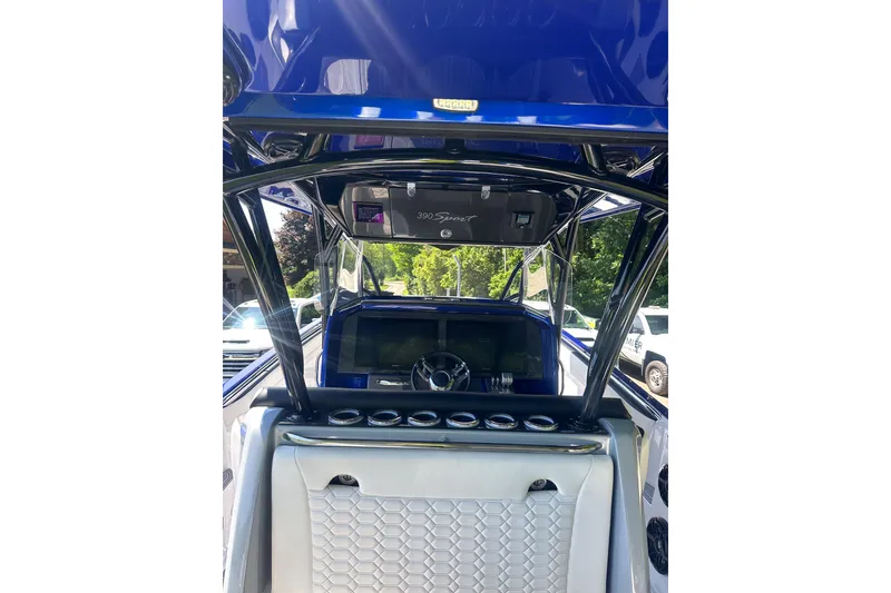 Slide: The Image of 2025 Nor-Tech 390 Sport Center Console interior with sleek design and modern controls. - 6