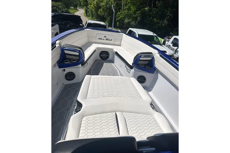 Slide: The Image of 2025 Nor-Tech 390 Sport Center Console with luxurious seating and modern design. - 10