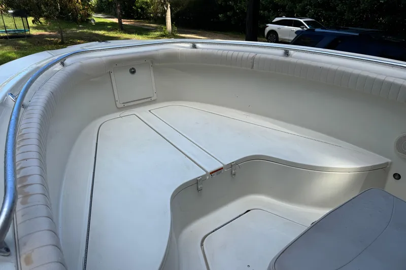 Slide: The Image of 2007 Hydra-Sports Vector 2500 CC boat interior with white seating and storage compartments. - 20