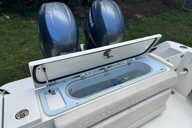 Slide: The Image of 2007 Hydra-Sports Vector 2500 CC boat with Yamaha engines and open storage compartment. - 16