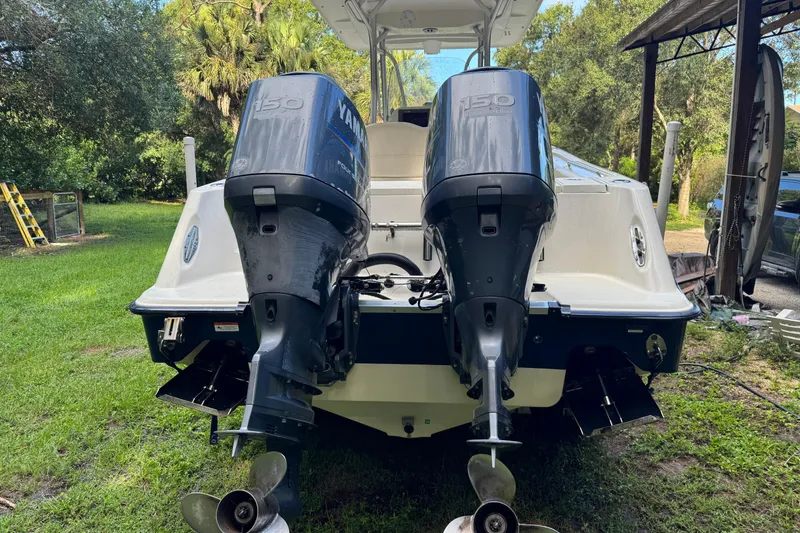 Slide: The Image of 2007 Hydra-Sports Vector 2500 CC with dual Yamaha 150 engines, parked on grass. - 3