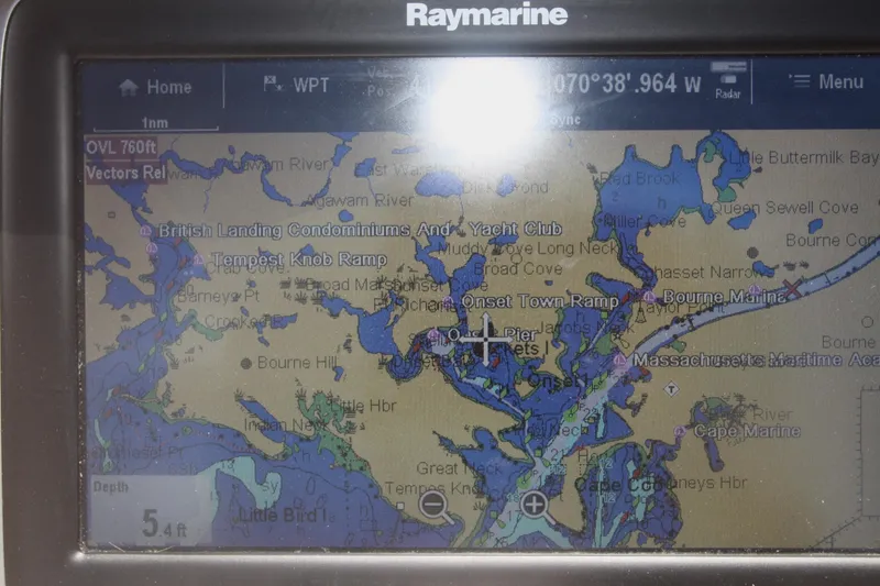 Slide: The Image of Raymarine GPS display showing nautical map with Marlago 35, 1996 coordinates. - 8