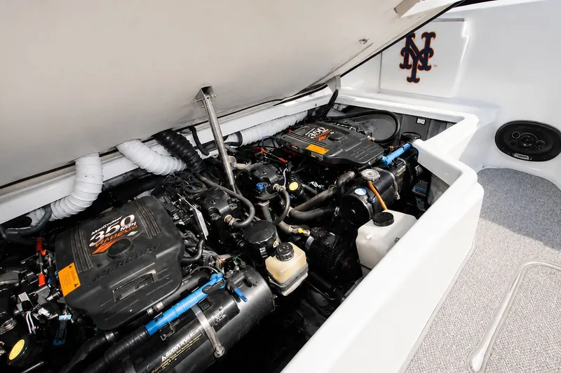 Slide: The Image of The engine compartment of a 2004 Formula 280 Sun Sport with two powerful engines and tidy wiring. - 22