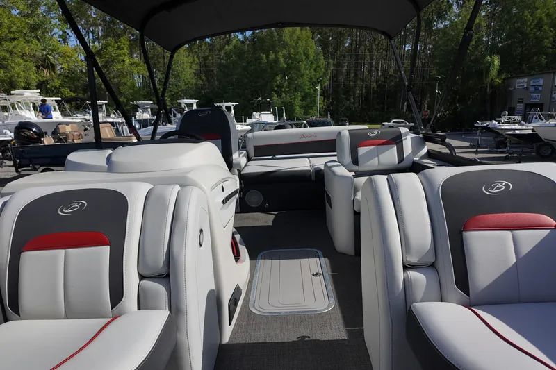 Slide: The Image of 2022 Barletta Corsa 23U pontoon boat interior with luxurious seating and modern design. - 9
