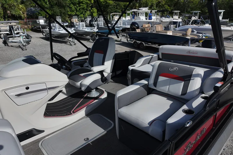 Slide: The Image of 2022 Barletta Corsa 23U pontoon boat interior with luxurious seating and modern design. - 10