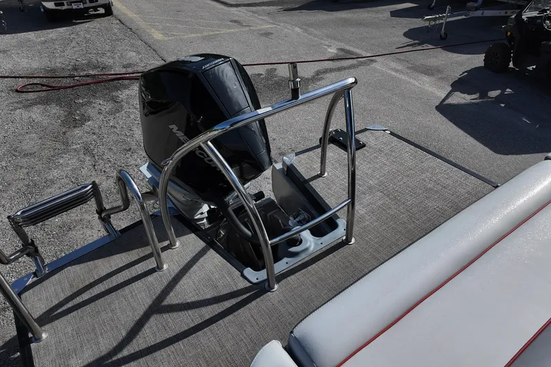 Slide: The Image of 2022 Barletta Corsa 23U boat with Mercury outboard motor and stainless steel railing. - 16