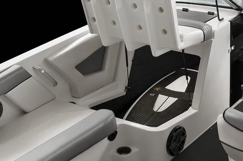 Slide: The Image of Manufacturer Provided Image: 2017 MasterCraft NXT22 boat interior with storage compartment and seating. - 2