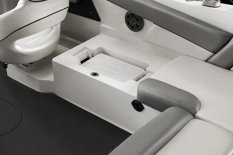 Slide: The Image of Manufacturer Provided Image: 2017 MasterCraft NXT22 boat interior with built-in cooler and seating. - 4