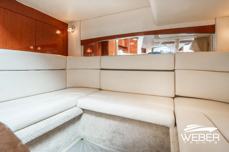 Slide: The Image of Luxurious interior of 2004 Sea Ray Sundancer 320 yacht with plush seating. - 17