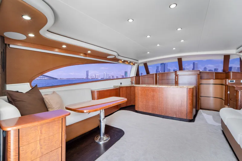 Slide: The Image of Luxurious interior of a 2022 Garlington Convertible with elegant wood accents and panoramic windows. - 35