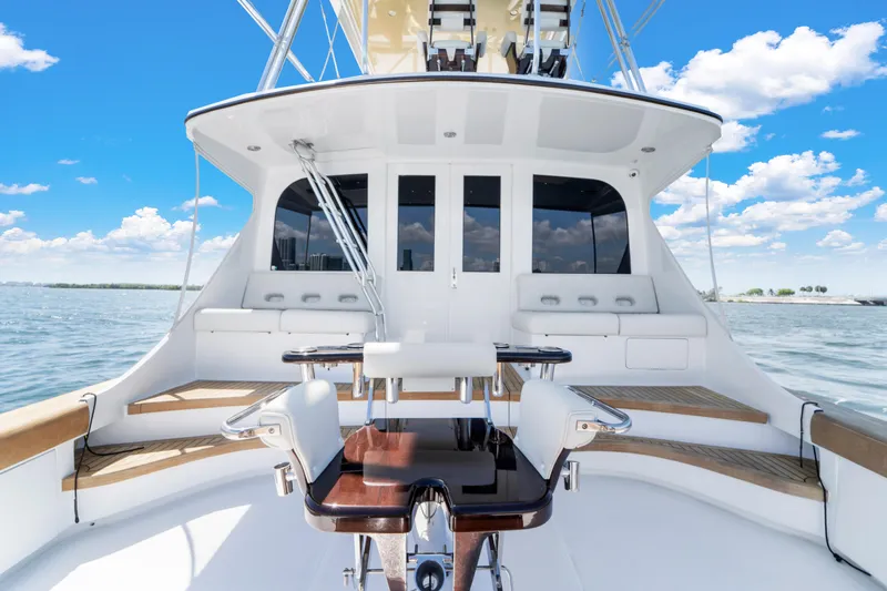 Slide: The Image of Garlington Convertible 2022: Sleek design with spacious deck, luxurious seating, and modern helm station. - 30