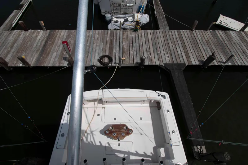 Slide: The Image of Overhead view of 2004 Tiara Yachts 4100 Open docked at a marina. - 18