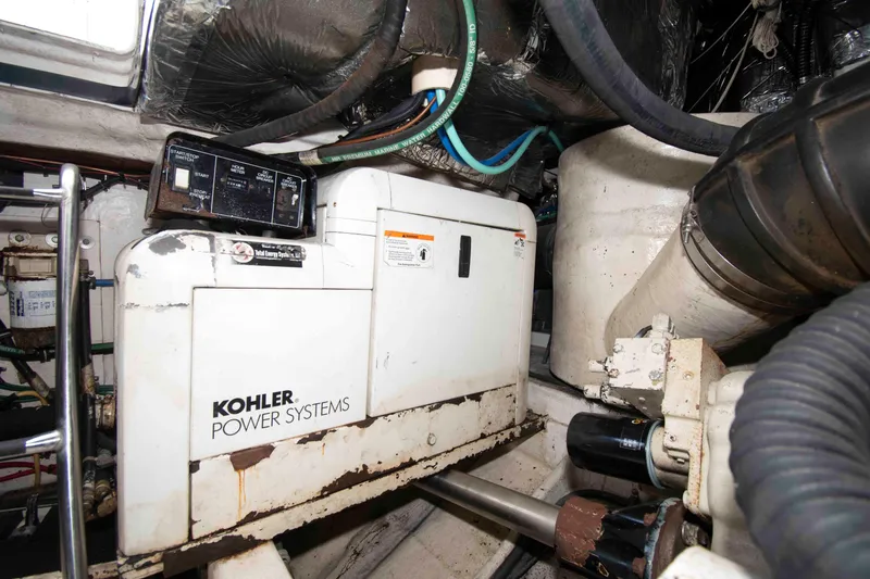 Slide: The Image of Engine room of 2004 Tiara Yachts 4100 Open featuring Kohler power systems. - 30