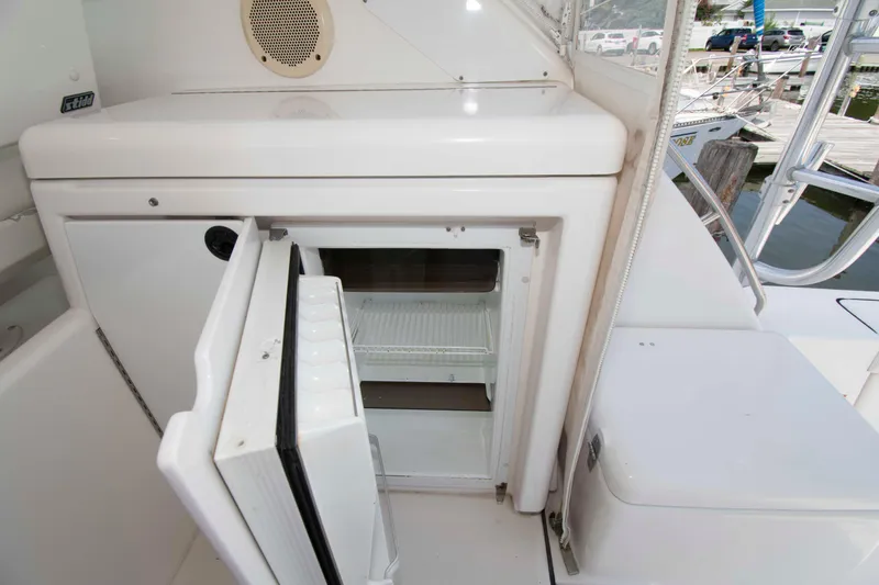 Slide: The Image of Open mini fridge on 2004 Tiara Yachts 4100 Open, dockside view. - 12