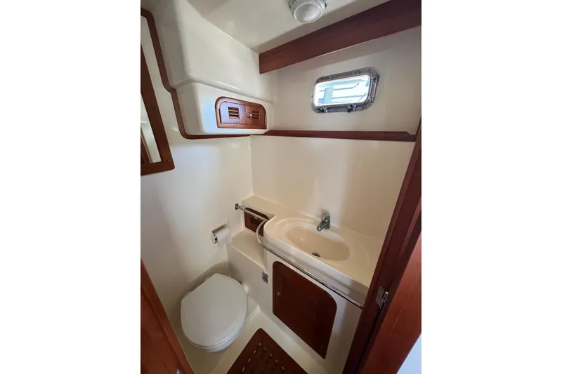 Slide: The Image of Bathroom interior of 2007 Heritage East 36 Sundeck Trawler with sink and toilet. - 21