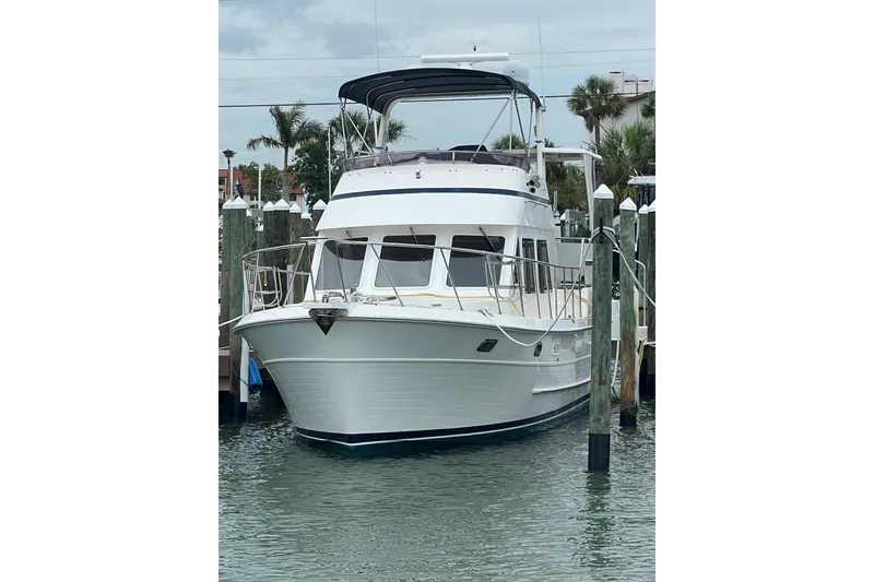 Slide: The Image of 2007 Heritage East 36 Sundeck Trawler docked at marina, front view. - 35