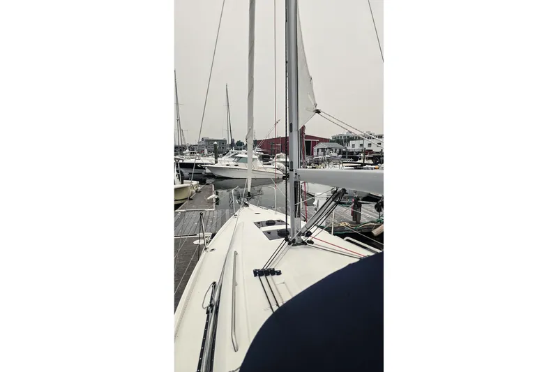 Slide: The Image of Beneteau Oceanis 30.1 sailboat docked at marina, 2022 model. - 32