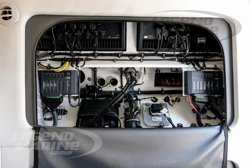 Slide: The Image of 2024 Nor-Tech 390 Sport Center Console electrical panel with wiring and components. - 58