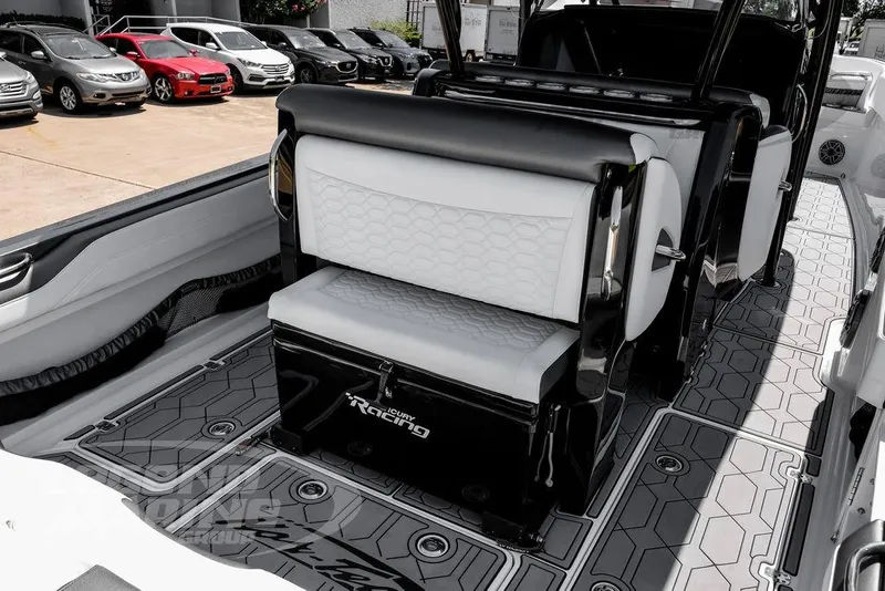 Slide: The Image of 2024 Nor-Tech 390 Sport Center Console interior with stylish seating and modern design. - 35